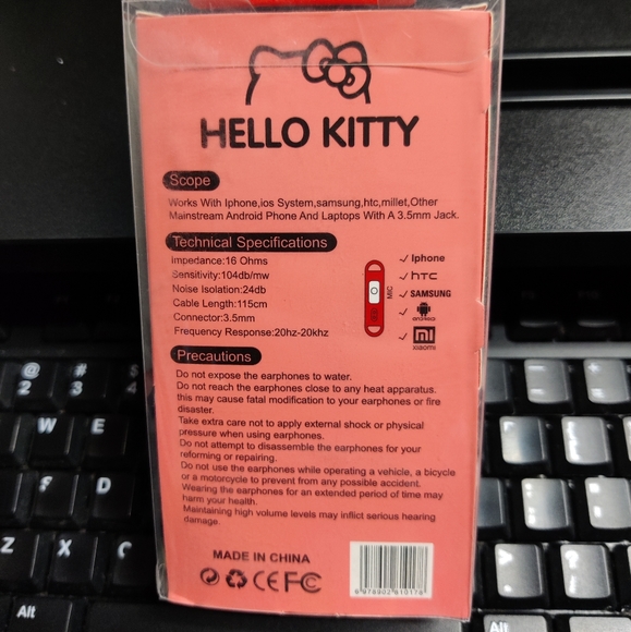 Red Hello Kitty 3.5 mm wired earphones with storage box - Picture 3 of 3